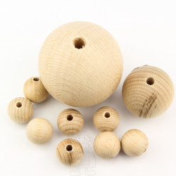 Palline di legno forate